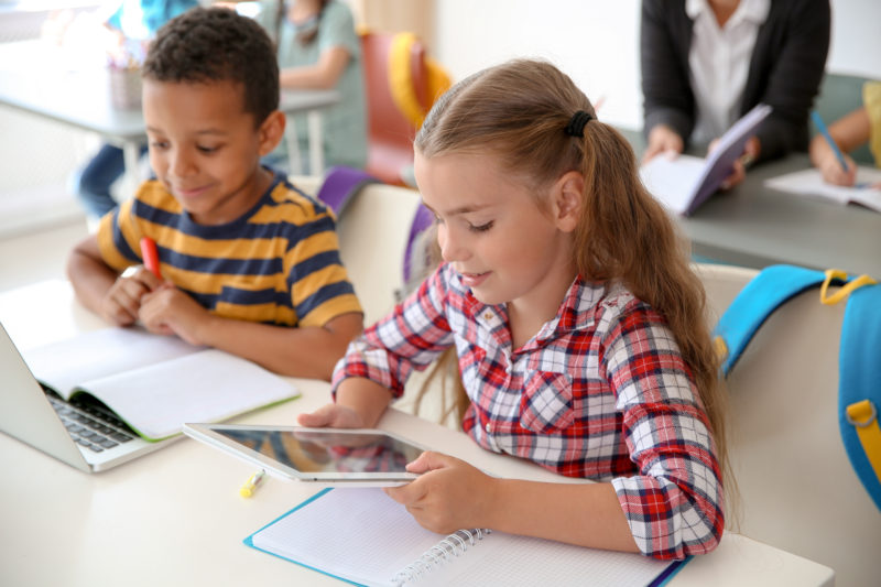 Kids reading in the interACTIVE classroom