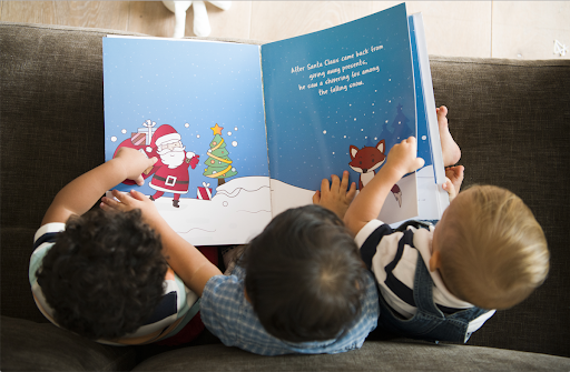Kids reading a holiday picture book
