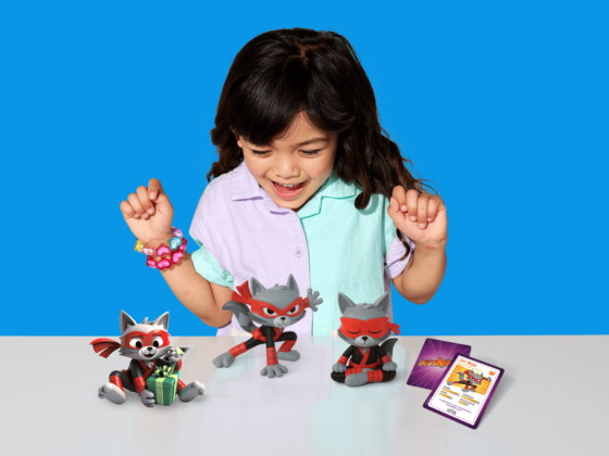 Child playing with Cat Ninja figurines, featuring the limited-edition Cat Ninja Toy collection inspired by the Cat Ninja Epic Originals book series.