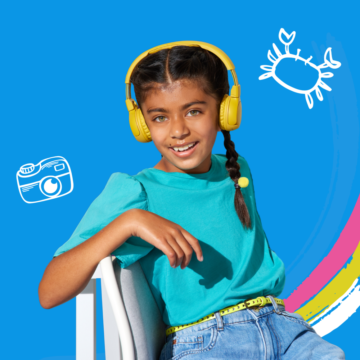 Middle school student wearing headphones and engaging in summer reading and learning activities
