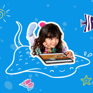 Elementary school student using a tablet for summer reading and learning activities